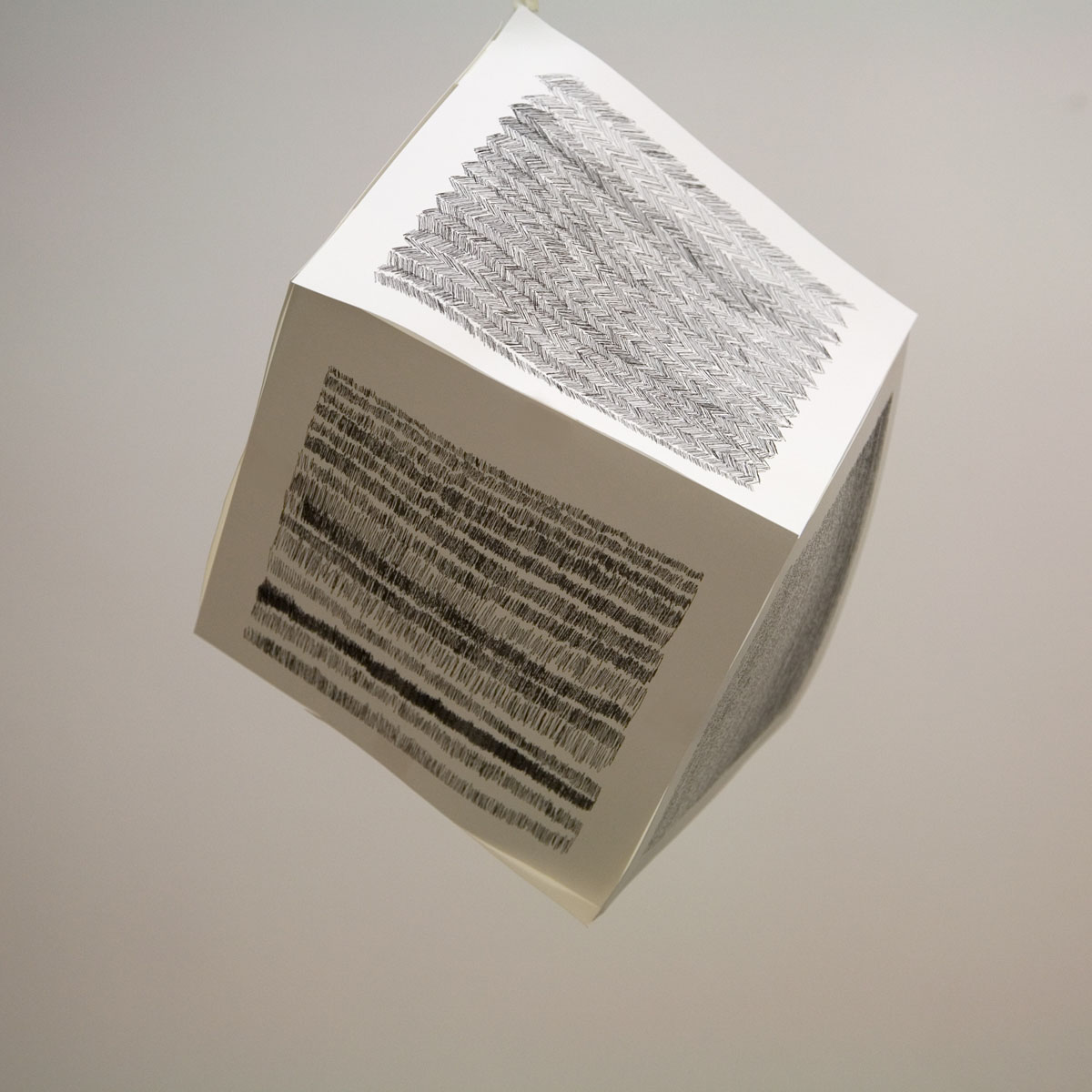 Inkjet prints, tape. 10 x 10 x 10", 2008.