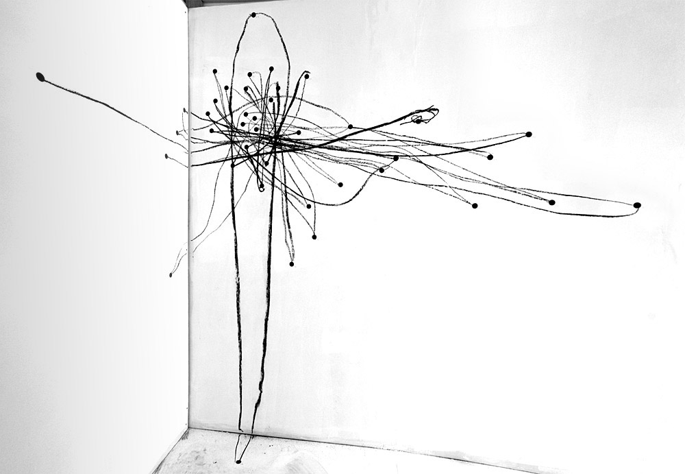 Enamel, pencil, and charcoal on a wall, 12